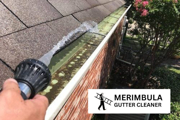 
Rinsing gutters by a professional in Wallagoot.